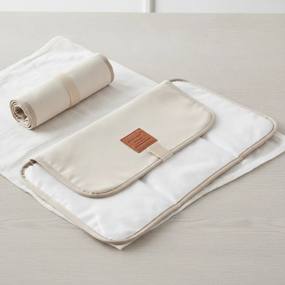 Tapis à langer nomade et imperméable